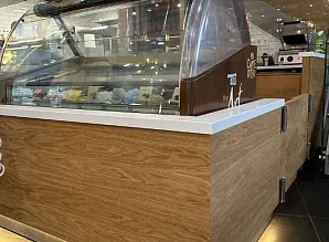 Производство барной стойки и нестандартной мебели для кафе-пекарни Cinnabon в ТРК Мозаика Фото 10