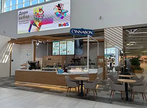 Барная стойка и мебель для кафе-пекарни Cinnabon в ТРЦ МЕГА Парнас в Санкт-Петербурге Фото 2