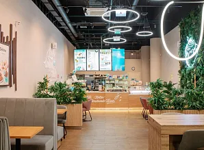 Барная стойка и мебель для кафе-пекарни Cinnabon в ТЦ «Парк Молл» в Санкт-Петербурге Фото 2